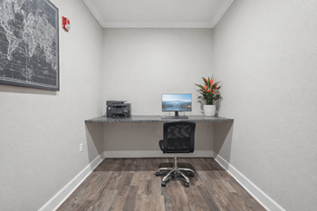 Business center workspace with wall mounted desk